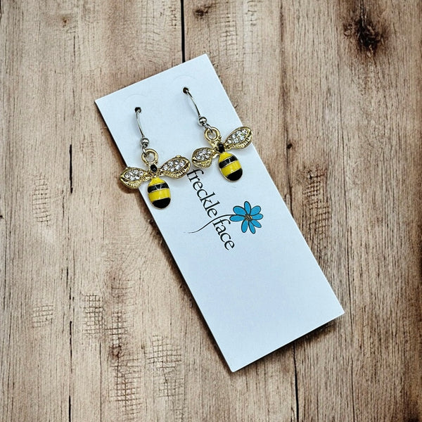 Nickel-free bumble bee drop earrings in yellow and black with tiny rhinestone wings