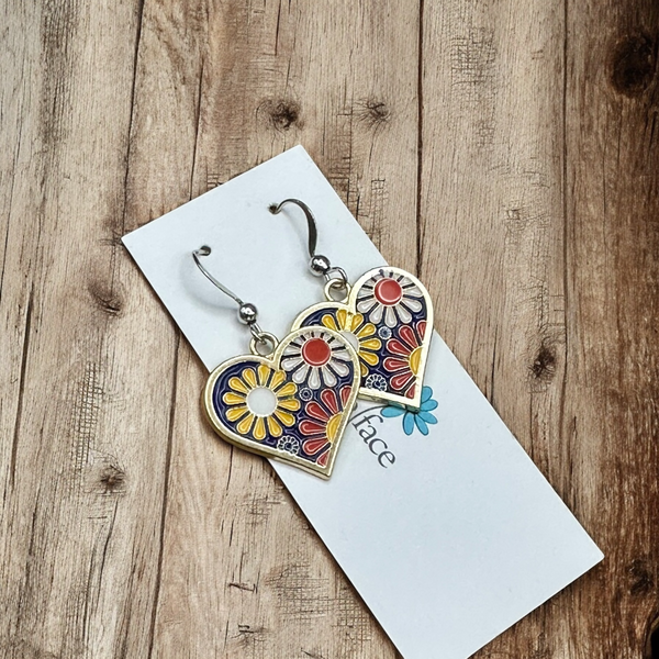Retro flower power earrings in bright enamel colors on Freckle Face card