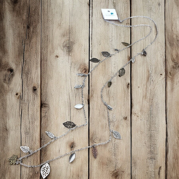 Long boho-style leaf pendant necklace in silver and mixed metals