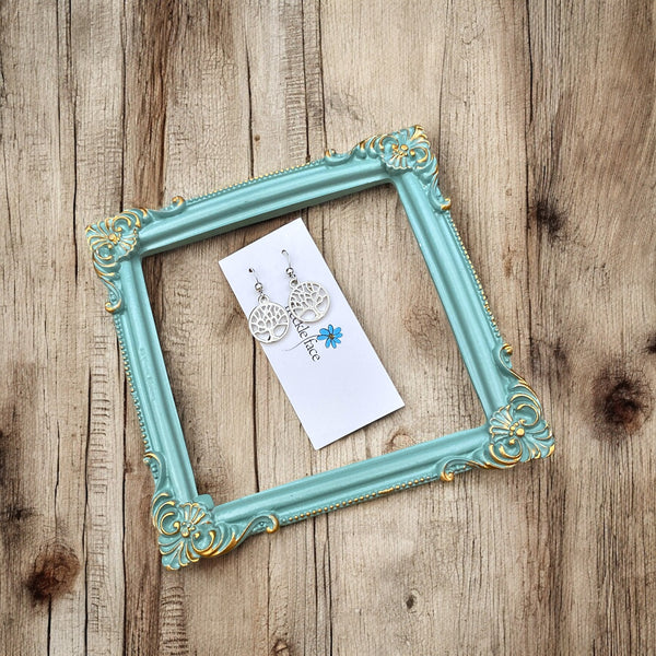 Lightweight tree dangle earrings with rhodium hooks and silicone stoppers