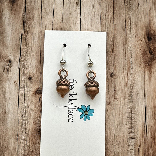 antique copper wilderness acorn earrings on Freckle Face brand earring card