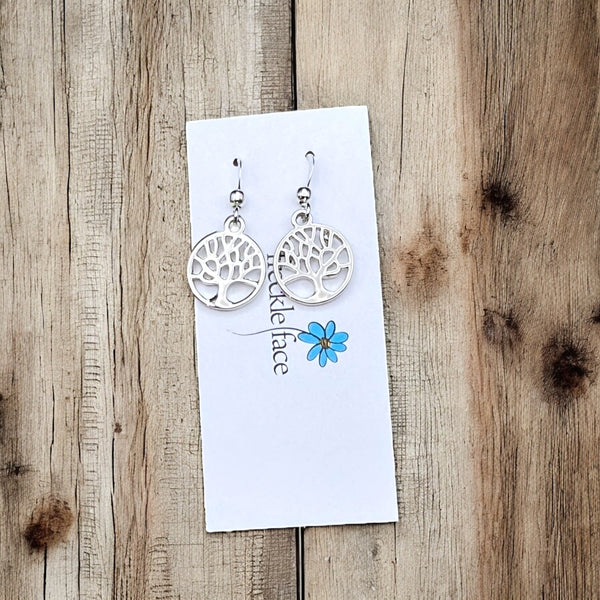 Glossy tree of life hypoallergenic dangle earrings with rhodium hooks and silicone stoppers