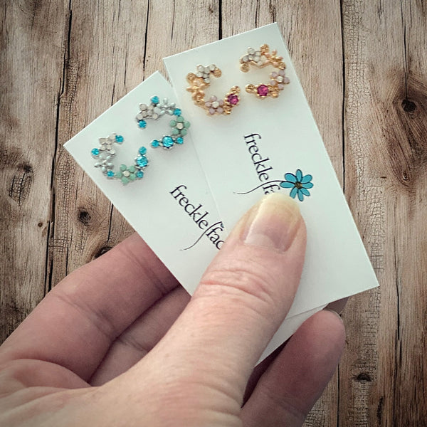 Pretty vintage style floral design studs available in two colors