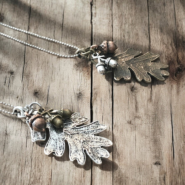 Nature-inspired oak leaf necklace with small acorn charms