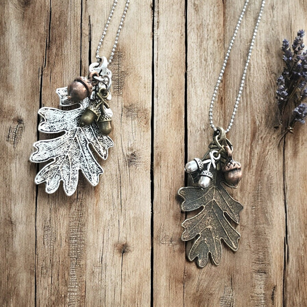 Silver-tone oak leaf and acorn necklace on stainless steel chain