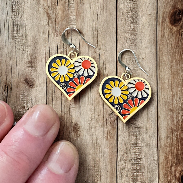 Colorful 60s inspired flower dangle earrings with bold petals in yellow, orange and white trimmed in gold