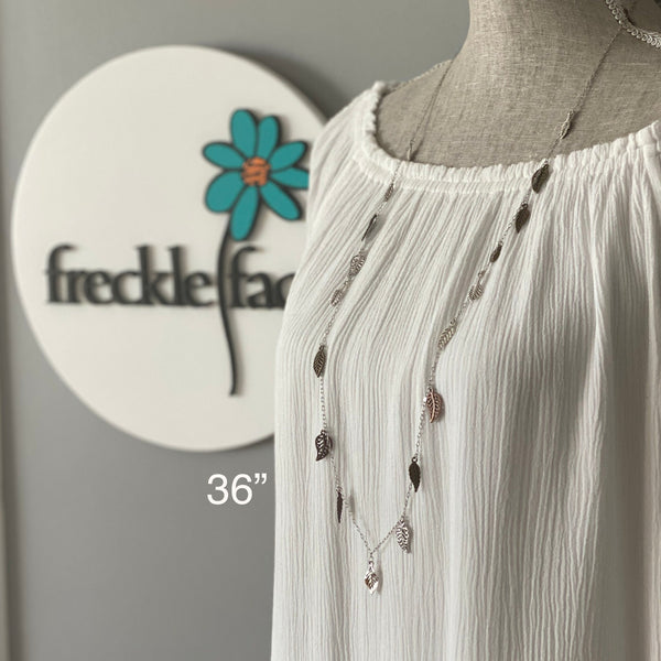 Mannequin wearing 36” Waterfall Leaf Necklace