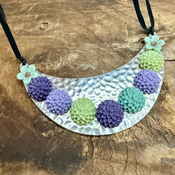 Bloom Garden Statement Necklace – Hammered Silver & Floral Crescent (Black Satin Ribbon)
