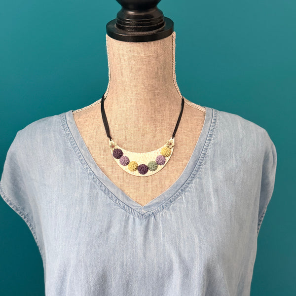Bloom Garden Statement Necklace – Hammered Silver & Floral Crescent (Black Satin Ribbon)