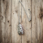 Triple Feather pendant necklace