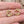 The backs of the pink and orange floral vintage stud earrings 