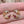 Vintage inspired flower crescent shape stud earrings with gold plating and pinks and orange colors 