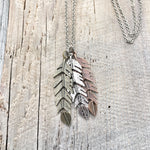 Triple Feather pendant necklace