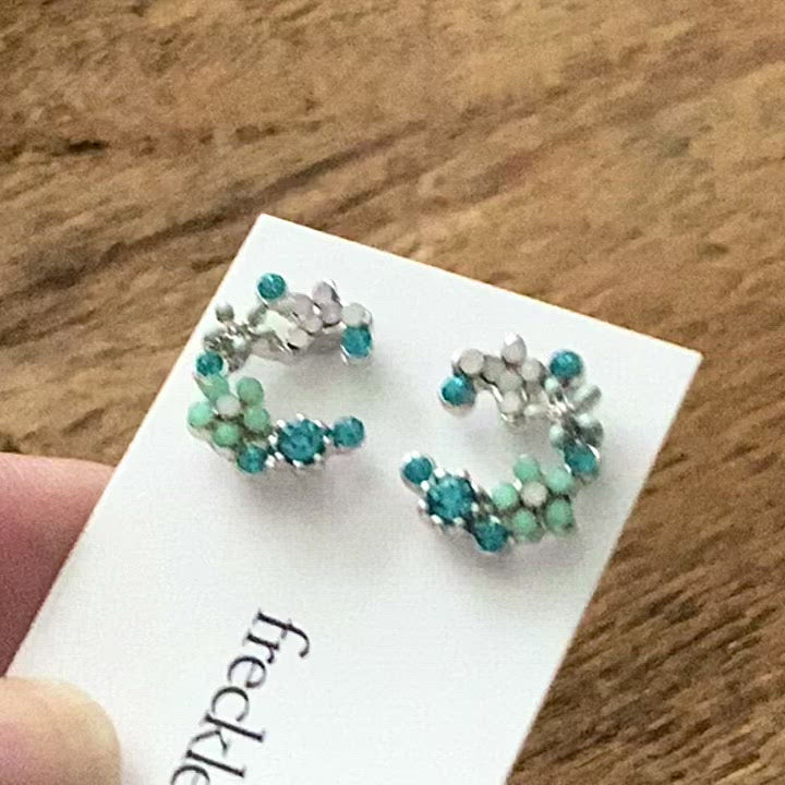Video of gold, pink and white vintage flower earrings 