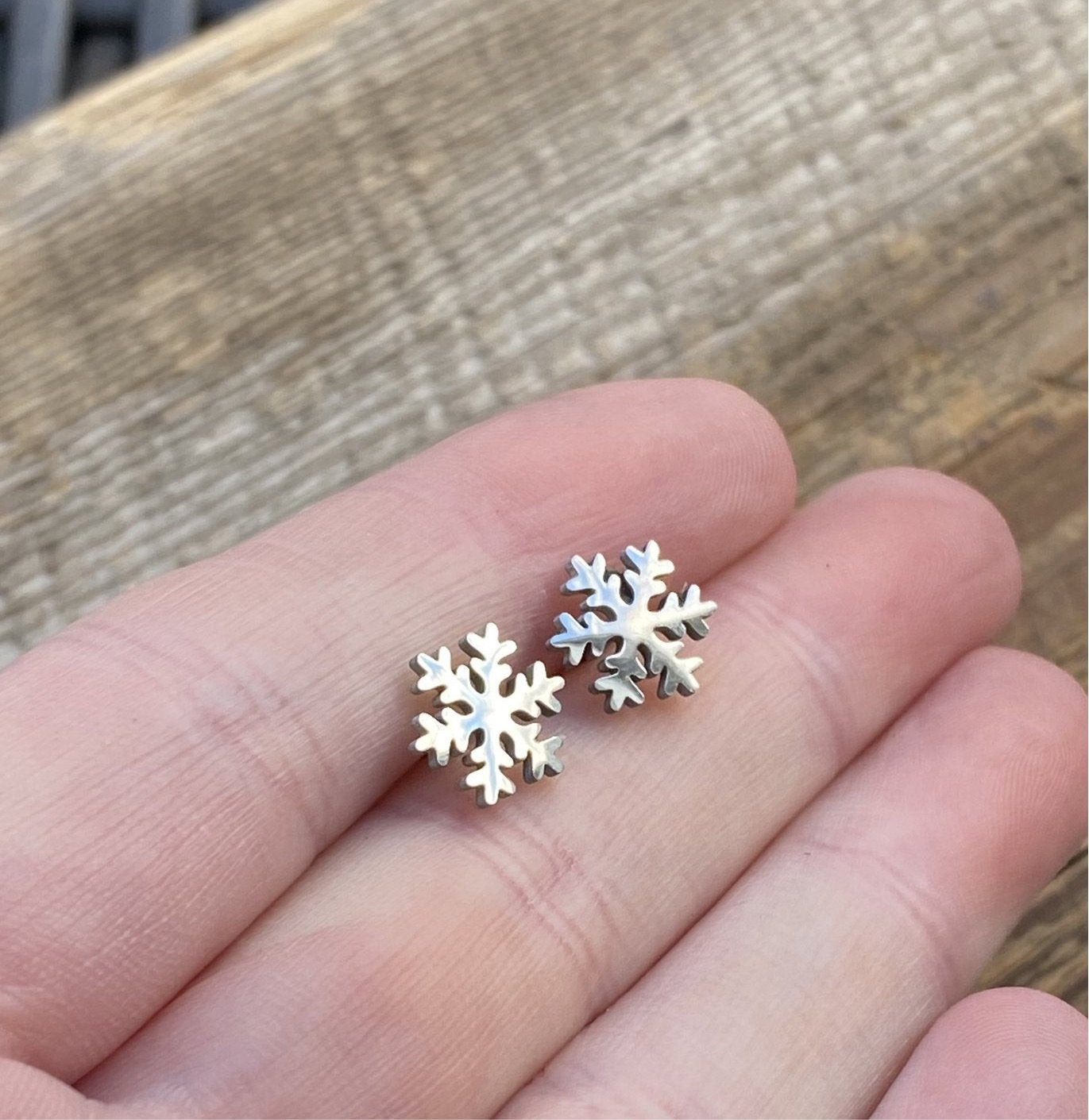 Stainless steel snowflake stud earrings