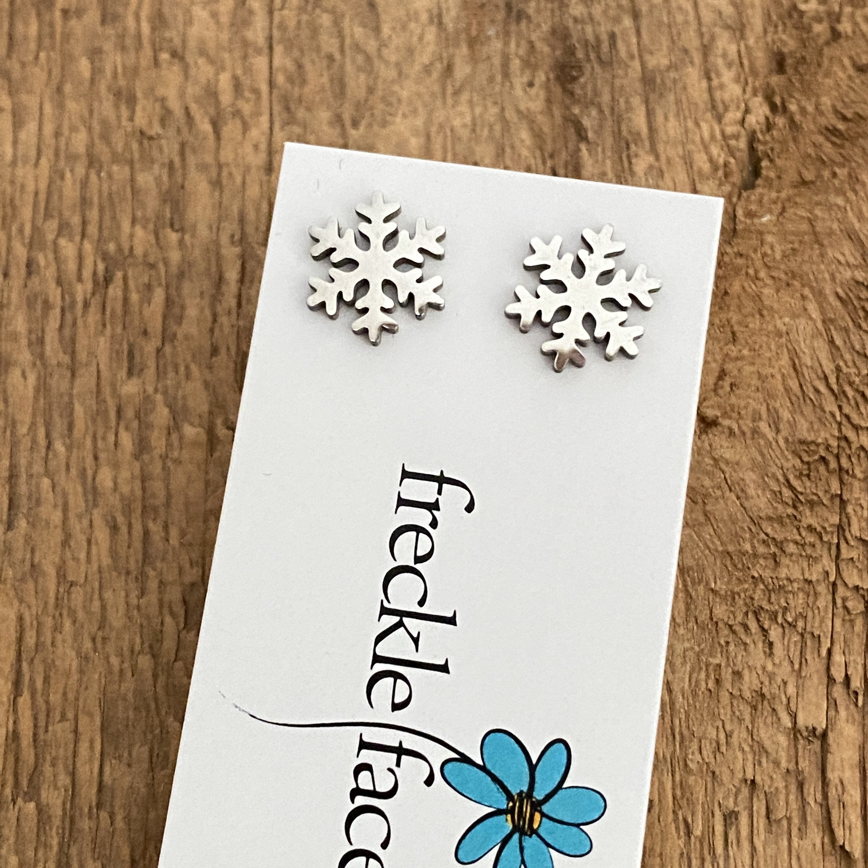 Stainless steel snowflake stud earrings