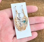 Delicate gold feather earrings